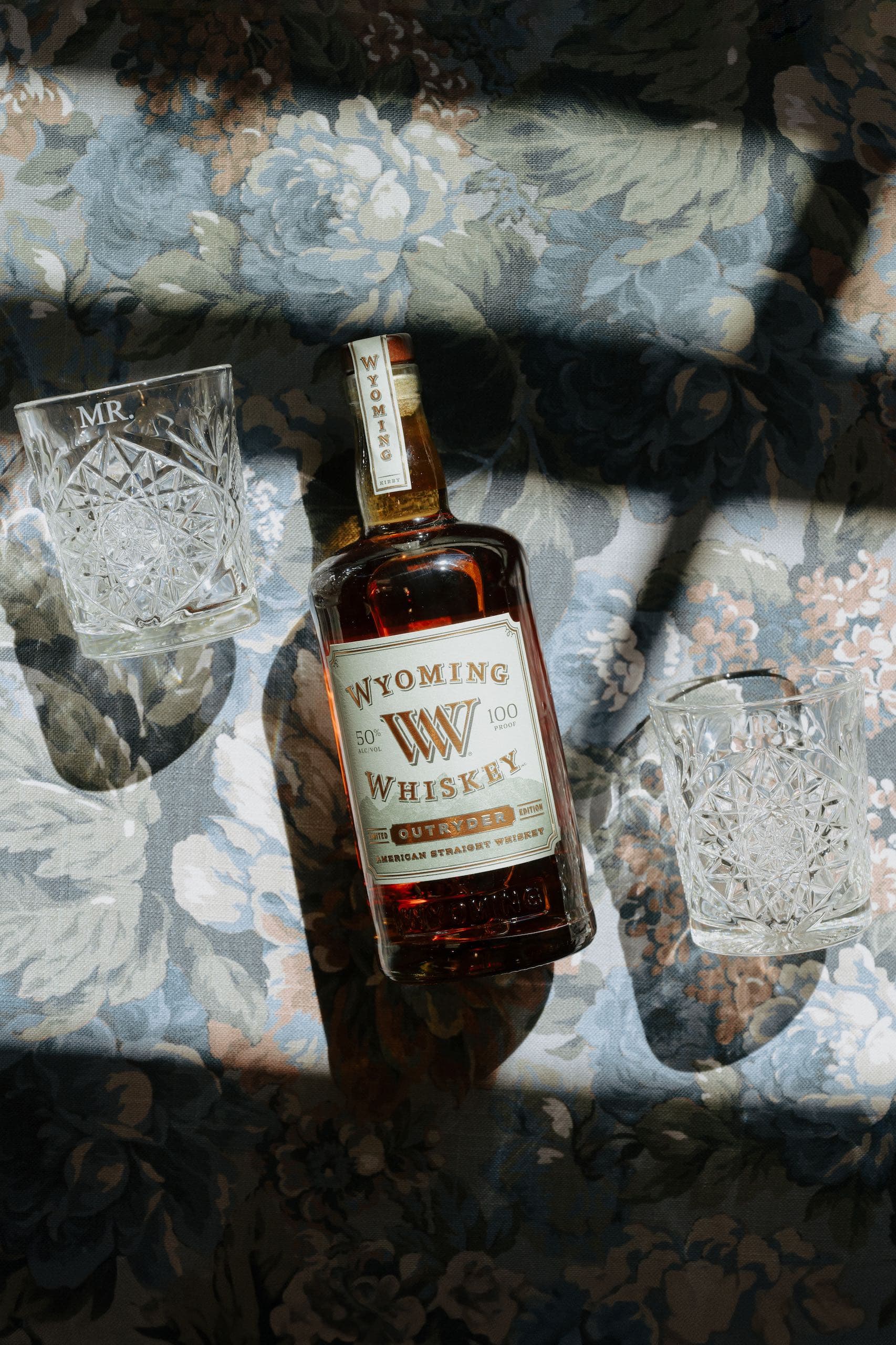 A photo of Wyoming Whiskey Outryder and two whiskey glasses