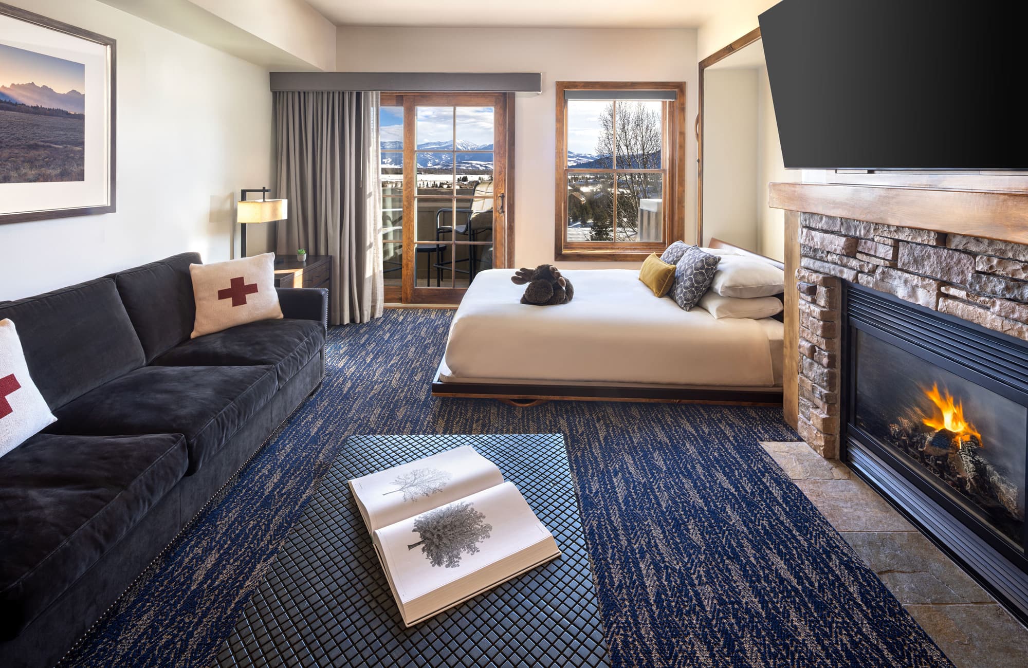 Living Room With A Balcony And Fireplace