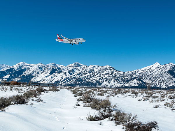 Airplane In Flight In The Tetons.