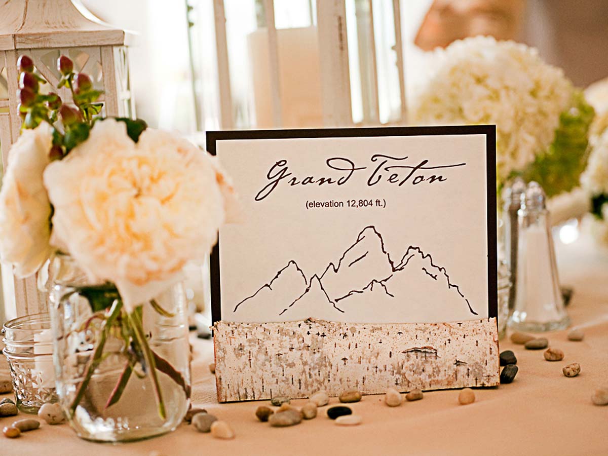 Grand Teton elevation 12,804 feet sign with flowers.