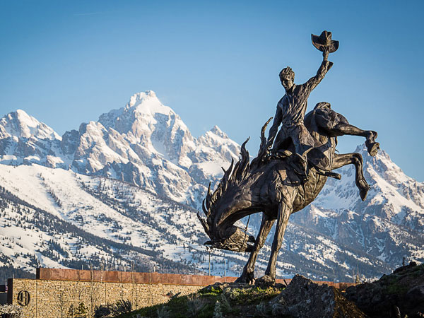 Cowboy Statue In The Snow.