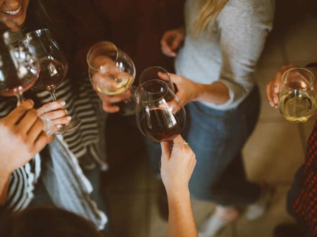 Group Of Friends Having Wine.