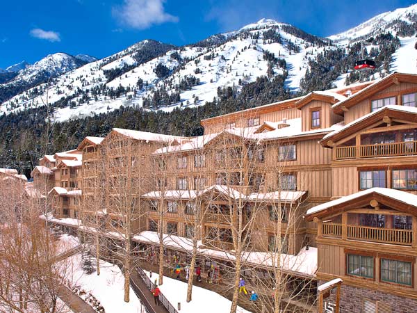 Teton Mountain Lodge Exterior During The Day In The Snow.