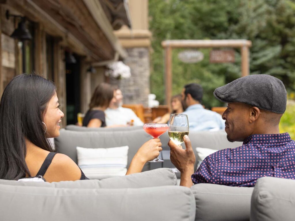 Couple With Drinks On The Patio